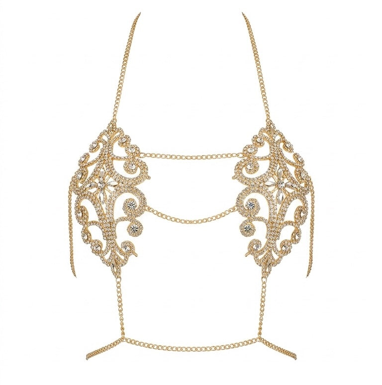 Gold ornate body chain on a white background